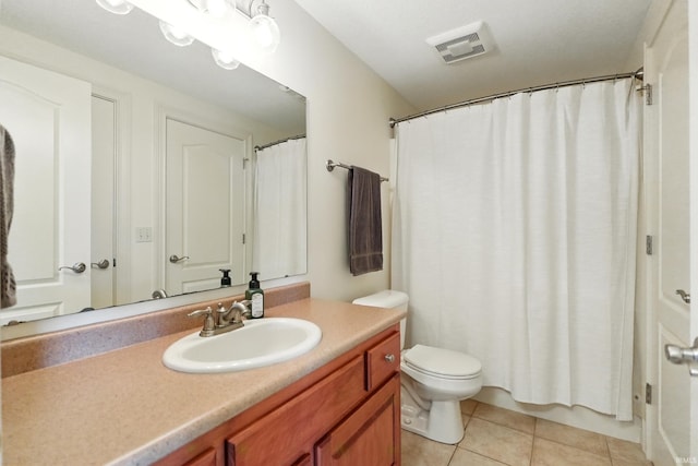 101 Twin Eagles Blvd W, Huntertown, IN 46748 - full bathroom with vanity, toilet, and tile patterned flooring