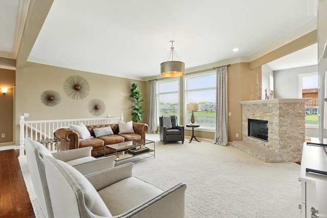 101 Twin Eagles Blvd W, Huntertown, IN 46748 - carpeted living room featuring ornamental molding, a fireplace, baseboards, and recessed lighting