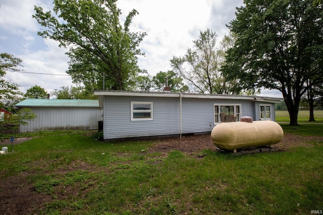 8147 15th Rd, Argos, IN 46501 - back of house featuring a yard