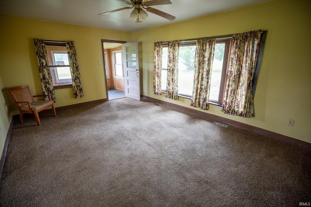 8147 15th Rd, Argos, IN 46501 - unfurnished room with ceiling fan, carpet floors, and baseboards