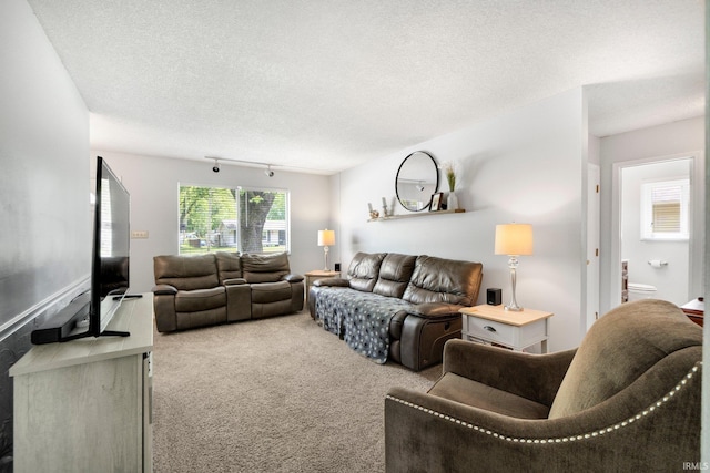 4618 Kekionga Dr, Fort Wayne, IN 46809 - carpeted living room with a textured ceiling