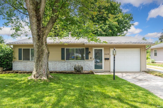 4618 Kekionga Dr, Fort Wayne, IN 46809 - single story home featuring a garage, a front lawn, driveway, and metal roof