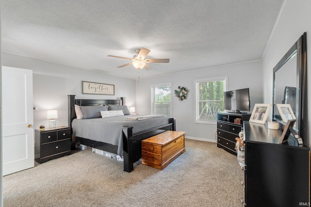 4618 Kekionga Dr, Fort Wayne, IN 46809 - carpeted bedroom with a textured ceiling, ceiling fan, and baseboards