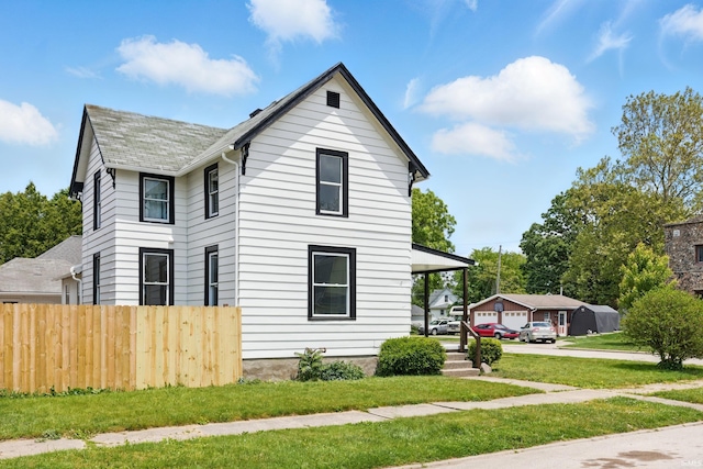44 E Taylor St, Huntington, IN 46750 - view of front of home featuring roof with shingles