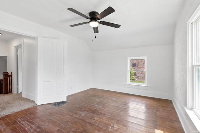 44 E Taylor St, Huntington, IN 46750 - spare room with vaulted ceiling, plenty of natural light, wood-type flooring, a ceiling fan, and baseboards