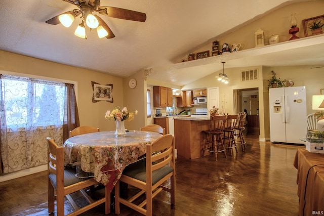 4555 E 250 S, Knox, IN 46534 - dining area featuring lofted ceiling, a ceiling fan, and dark wood finished floors