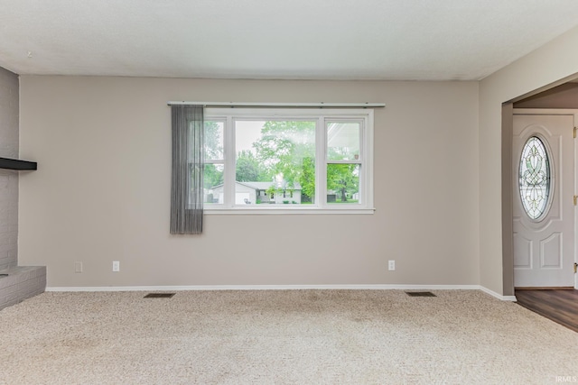 3608 W 31st St, Muncie, IN 47302 - entryway with carpet flooring and baseboards
