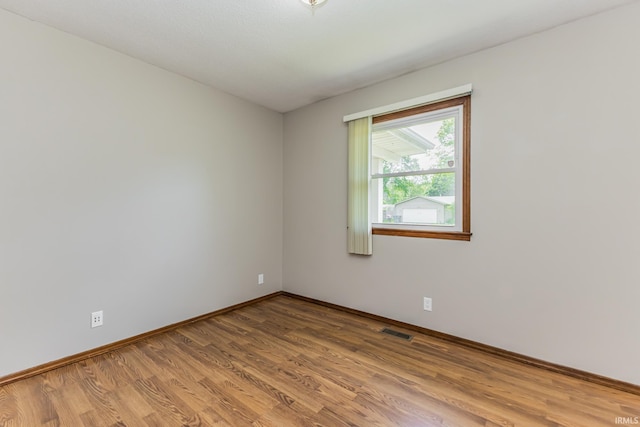 3608 W 31st St, Muncie, IN 47302 - spare room with wood finished floors and baseboards