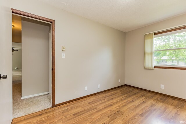 3608 W 31st St, Muncie, IN 47302 - unfurnished room with light wood-style flooring and baseboards