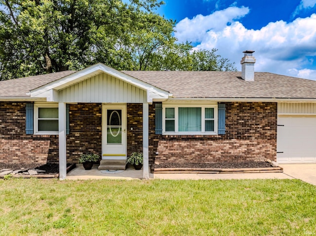 3608 W 31st St, Muncie, IN 47302 - single story home with brick siding, a chimney, a front lawn, and an attached garage