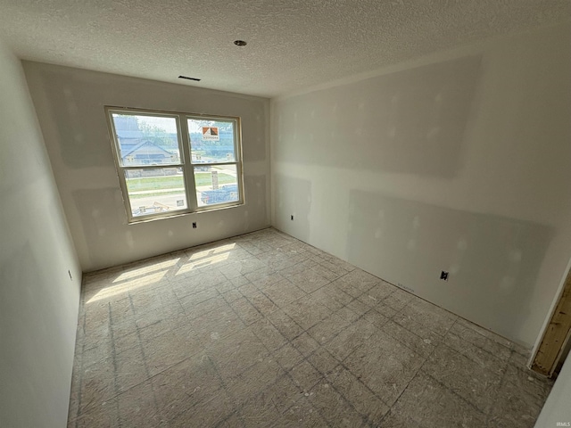 4792 Falcon Pkwy, New Haven, IN 46774 - unfurnished room with a textured ceiling