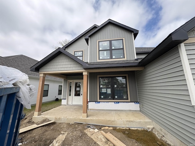 4792 Falcon Pkwy, New Haven, IN 46774 - rear view of property with a porch and roof with shingles