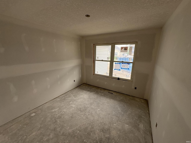 4792 Falcon Pkwy, New Haven, IN 46774 - unfurnished room featuring a textured ceiling