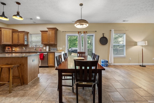 4665 S 150 E, Lafayette, IN 47909 - dining area featuring a textured ceiling, baseboards, and recessed lighting