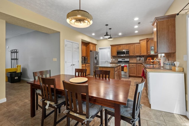 4665 S 150 E, Lafayette, IN 47909 - dining area featuring light tile patterned floors, baseboards, and recessed lighting