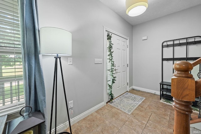 4665 S 150 E, Lafayette, IN 47909 - entryway with baseboards and a textured ceiling