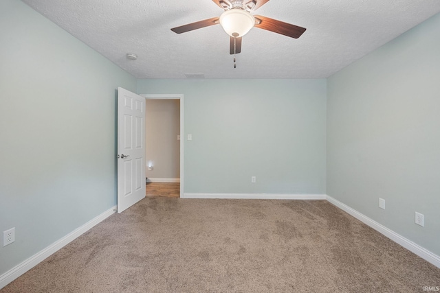 4665 S 150 E, Lafayette, IN 47909 - carpeted spare room featuring a textured ceiling, ceiling fan, baseboards, and a smoke detector
