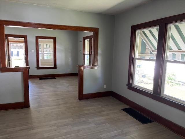 1515 E Donald St, South Bend, IN 46613 - empty room with baseboards and light wood-type flooring