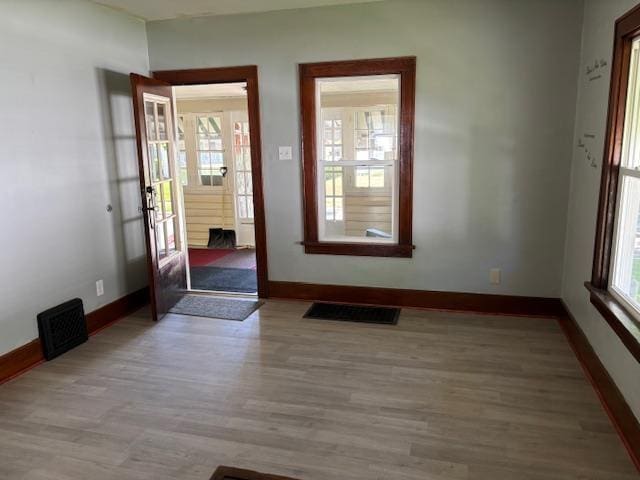 1515 E Donald St, South Bend, IN 46613 - foyer featuring baseboards and wood finished floors