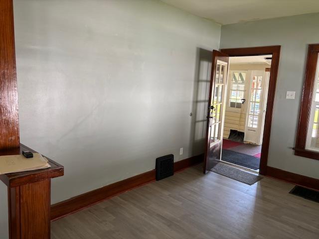 1515 E Donald St, South Bend, IN 46613 - empty room featuring wood finished floors and baseboards