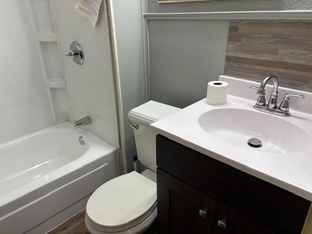 1515 E Donald St, South Bend, IN 46613 - bathroom featuring toilet, vanity, and shower / tub combination