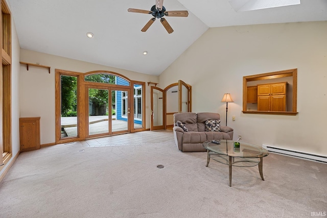 56 Jester Ct, Lafayette, IN 47905 - living room featuring baseboard heating, light colored carpet, lofted ceiling, a ceiling fan, and baseboards