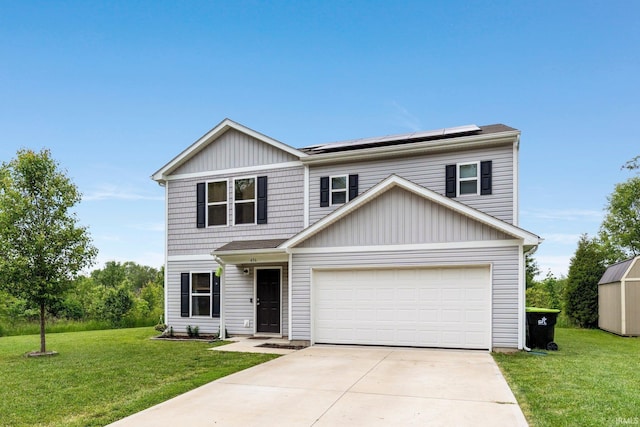 496 Arbor Ln, Huntington, IN 46750 - view of front of property featuring roof mounted solar panels, a front lawn, concrete driveway, and an attached garage