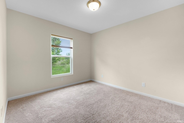 496 Arbor Ln, Huntington, IN 46750 - carpeted empty room featuring baseboards