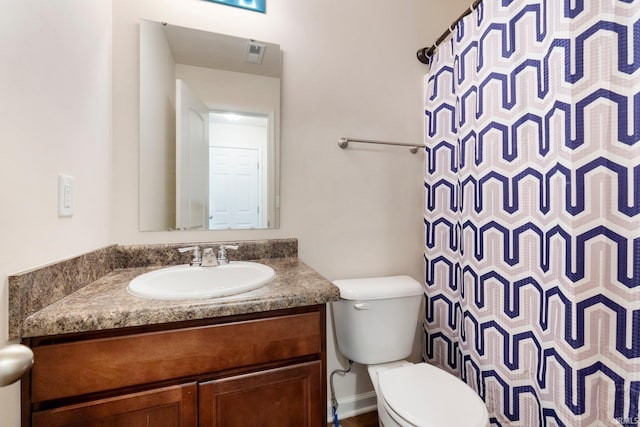 496 Arbor Ln, Huntington, IN 46750 - full bathroom featuring vanity, toilet, and a shower with shower curtain