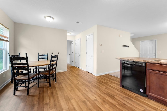 496 Arbor Ln, Huntington, IN 46750 - dining room with light wood-style flooring and baseboards