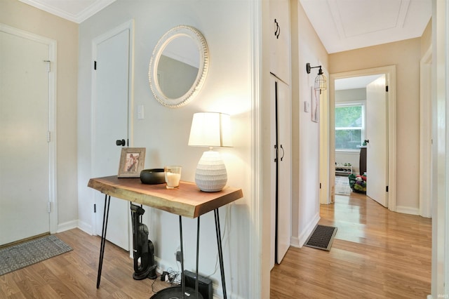 2012 Clayton Ave, Evansville, IN 47715 - corridor featuring light wood-style floors, baseboards, and ornamental molding