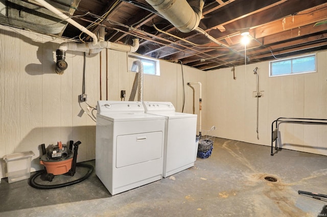 2012 Clayton Ave, Evansville, IN 47715 - laundry area featuring washer and dryer and wooden walls