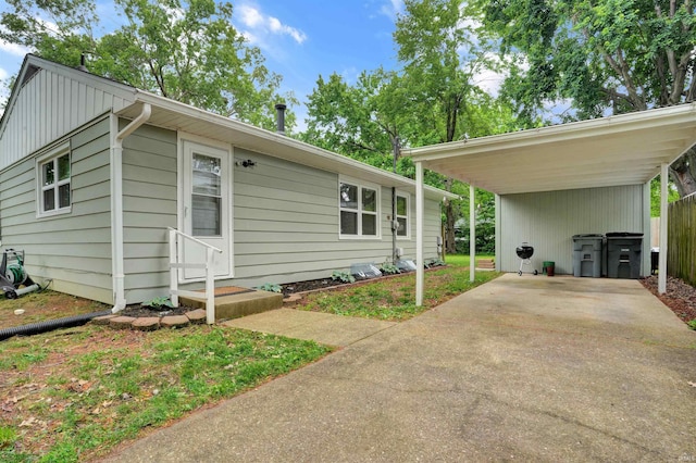 2012 Clayton Ave, Evansville, IN 47715 - view of side of property featuring driveway and a carport