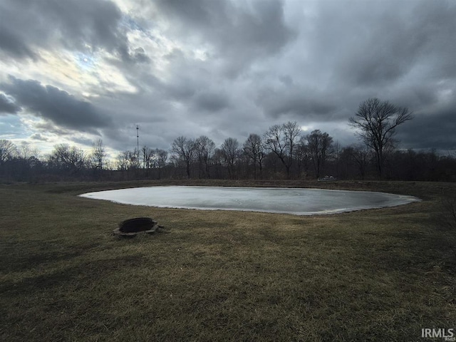 1230 S Iron Mountain Rd, Bloomfield, IN 47424 - view of swimming pool featuring a lawn