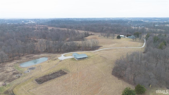 1230 S Iron Mountain Rd, Bloomfield, IN 47424 - aerial overview of property's location featuring a forest and rural landscape