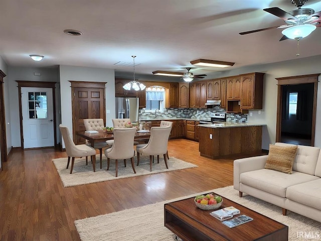 1230 S Iron Mountain Rd, Bloomfield, IN 47424 - living room with a ceiling fan and light wood-type flooring