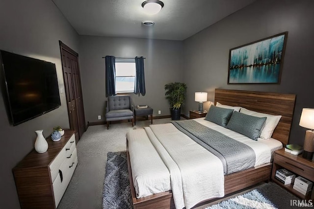 1230 S Iron Mountain Rd, Bloomfield, IN 47424 - bedroom featuring carpet and baseboards