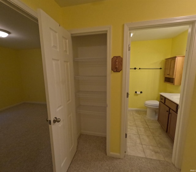 3408 Fox Ct, Evansville, IN 47711 - bathroom featuring vanity, toilet, baseboards, and tile patterned floors