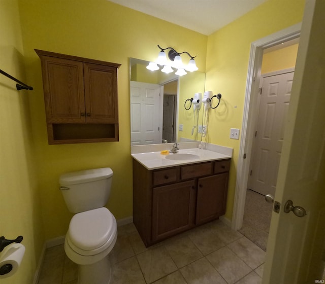 3408 Fox Ct, Evansville, IN 47711 - bathroom with vanity, toilet, tile patterned flooring, and baseboards