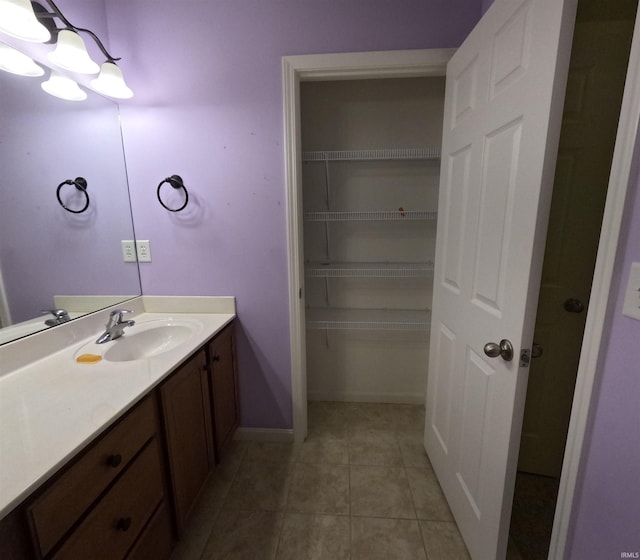 3408 Fox Ct, Evansville, IN 47711 - bathroom with vanity, tile patterned flooring, and baseboards