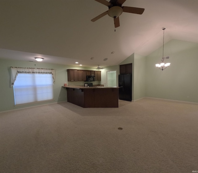 3408 Fox Ct, Evansville, IN 47711 - kitchen featuring black appliances, a peninsula, lofted ceiling, open floor plan, and light carpet