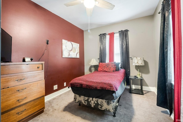 285 N Center St, Waterloo, IN 46793 - bedroom with light carpet, baseboards, and ceiling fan