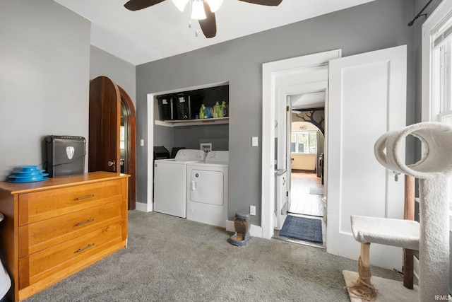 285 N Center St, Waterloo, IN 46793 - laundry room featuring washing machine and clothes dryer, ceiling fan, light carpet, and baseboards