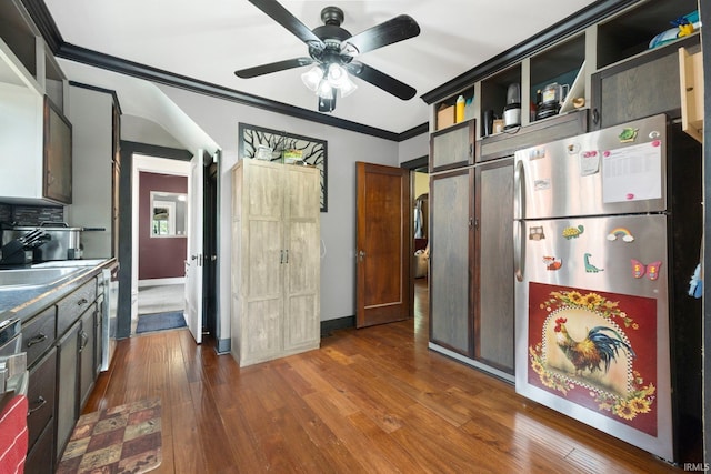285 N Center St, Waterloo, IN 46793 - kitchen featuring open shelves, freestanding refrigerator, ornamental molding, a sink, and a ceiling fan
