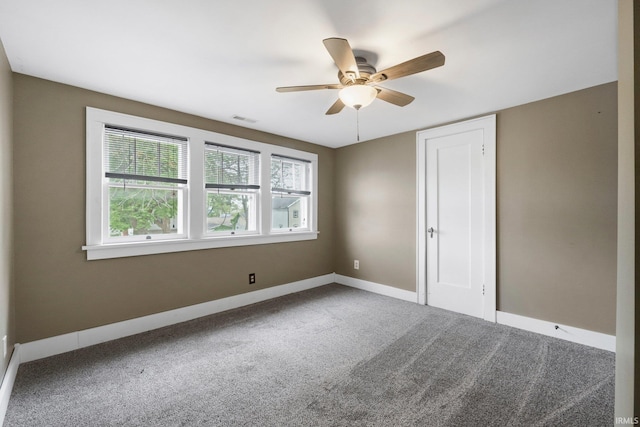 285 N Center St, Waterloo, IN 46793 - unfurnished bedroom with carpet, multiple windows, and baseboards