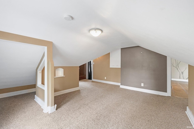 285 N Center St, Waterloo, IN 46793 - bonus room with carpet flooring, lofted ceiling, and baseboards