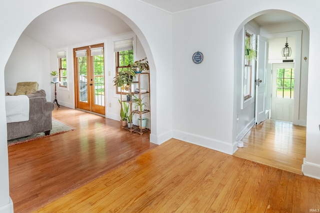 5889 E 46th Rd, Bloomington, IN 47408 - entrance foyer featuring light wood-style flooring, baseboards, and french doors