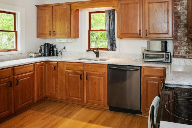 5889 E 46th Rd, Bloomington, IN 47408 - kitchen featuring dishwasher, black / electric stove, light wood finished floors, and a sink