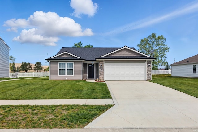 3436 Fawn Creek Blvd, Waterloo, IN 46793 - single story home with an attached garage, driveway, and stone siding