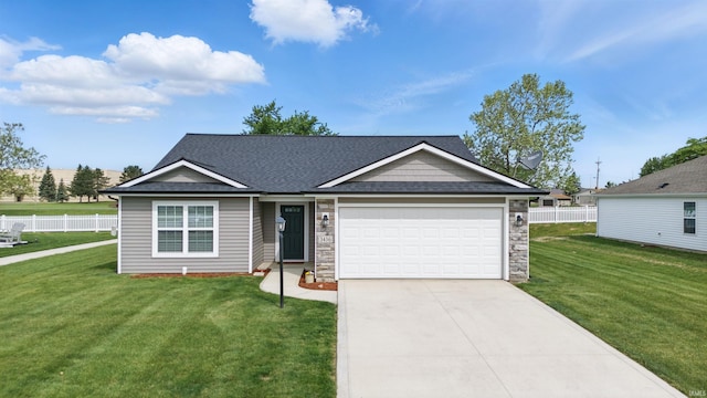 3436 Fawn Creek Blvd, Waterloo, IN 46793 - view of front facade featuring a shingled roof, a garage, concrete driveway, and stone siding